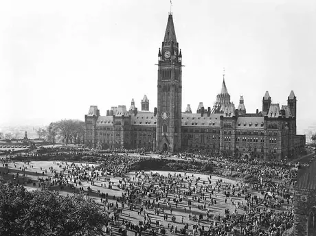 Crowds gather around the Parliament Building to see Princess Elizabeth and the Duke of Edinburgh during the 1951 coast-to-coast Royal Tour of Canada
