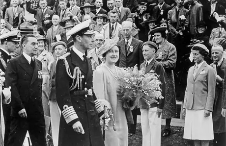 King George VI and Queen Elizabeth surrounded by a crowd of well-wishers during the 1939 Royal Tour of Canada