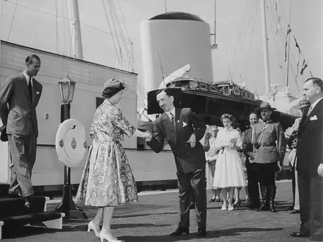 Queen Elizabeth and Prince Philip are greeted as they disembark from the HM Yacht Britannia during the 1959 Royal Tour of Canada