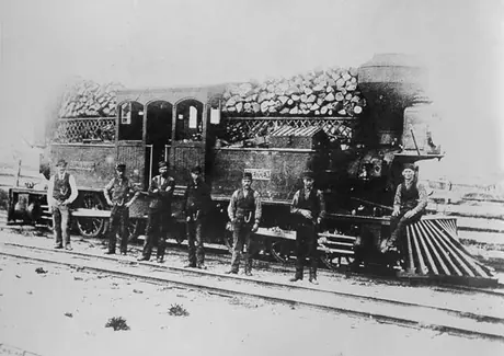 Crew poses with Toronto and Nipissing Railway Company wood burning steam locomotive The Shedden