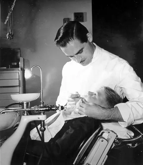 Dr. Alex Mclean examines Keith Nicholson