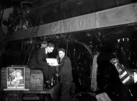 Employees at CN locomotive shop buying bonds