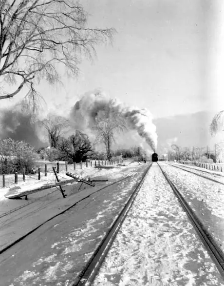 Telegraph pole, left, damaged by winter storm