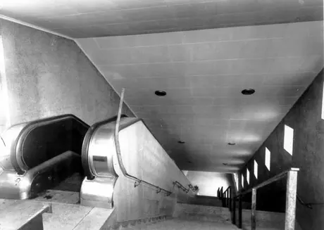 Stairway and escalator to station area