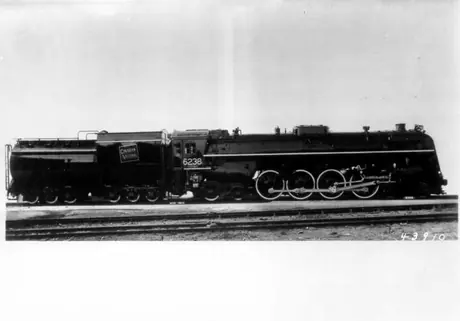 Broadside of steam locomotive 6238