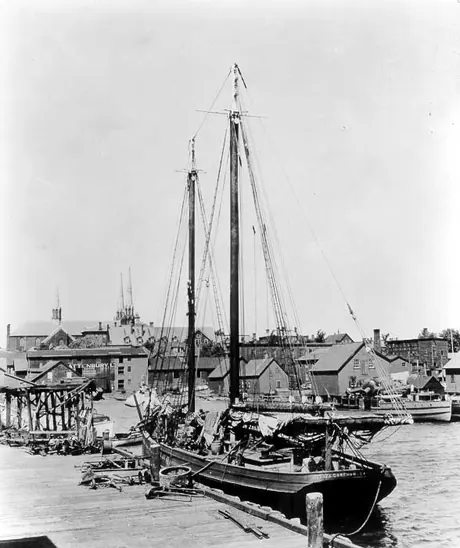 A banks schooner docked in Charlottetown Harbour