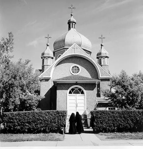 Worshipers entering a church in Regina
