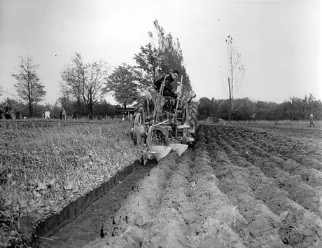 Participant breaking soil in the International ploughing match