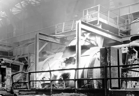 Pouring ore from the rotary convertor, Mond Nickel Co. Coniston Mine
