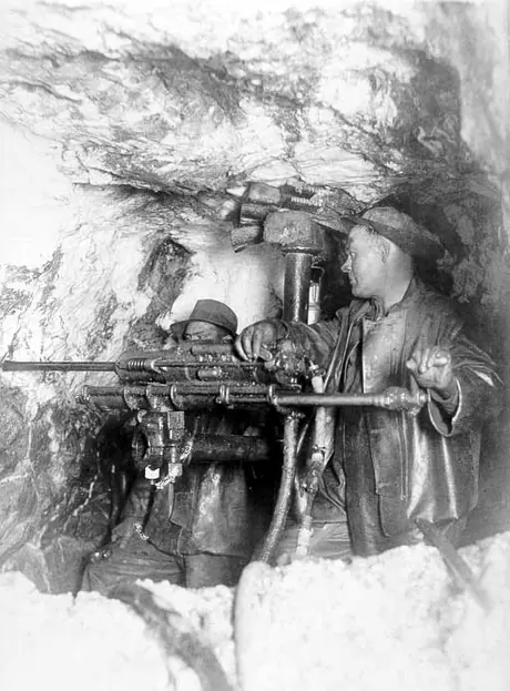 Miners drilling at 1000 feet, Coniaurum Mine