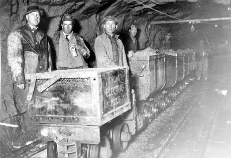 Miners with electric mule at 1000 feet within the Wrighthargreaves Mine