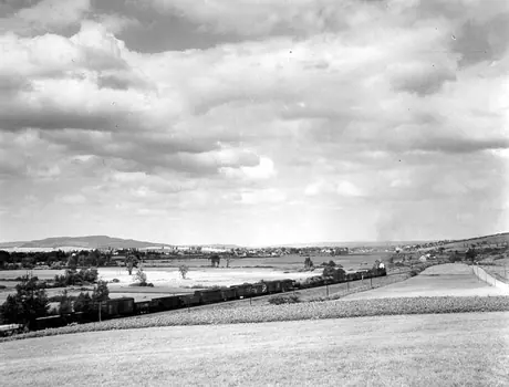CNR freight train in open rolling country near Sussex