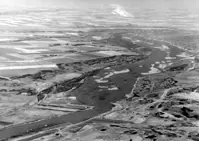 Aerial view of Southern Saskatchewan with dam under construction