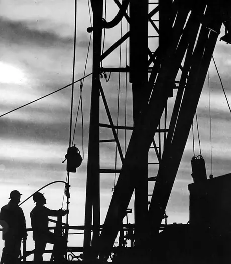 Workers on an oil rig, Smiley, Saskatchewan