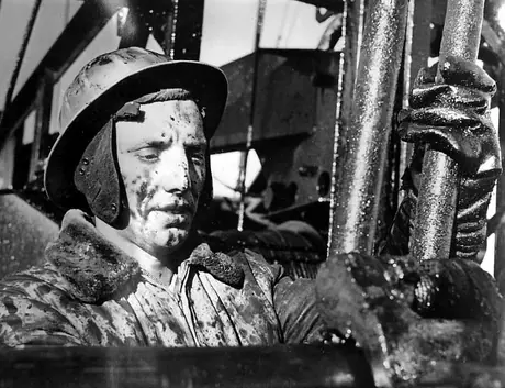 Employee covered in oil from a Smiley, Saskatchewan strike