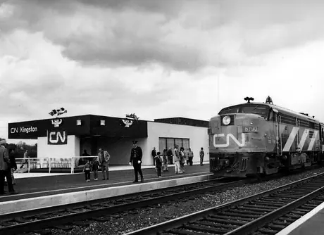 Spectators and passengers at the official opening of Kingston Station