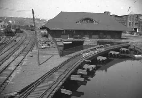 Hurricane damage affecting the Central Vermont Railway station at Norwich, Connecticut