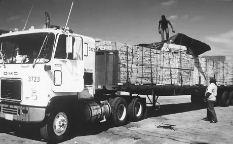A loaded truck at a lumber distribution yard on the Central Vermont Railway.
