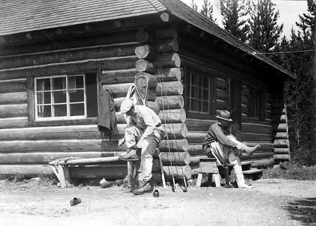 Fishermen outside their chalet, Maligne Lake