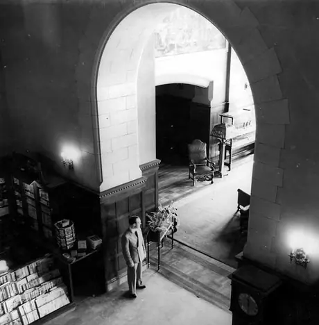 Standing in the archway of the MacDonald Hotel lobby