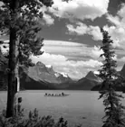 Camera tour party canoeing on Maligne Lake