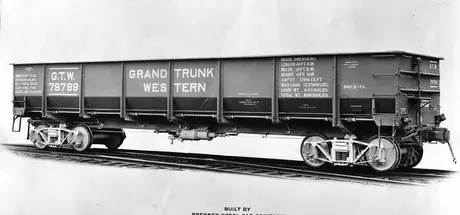 Grand Trunk Western side dump gondola 79799 with doors closed.  Built by Pressed Steel Car Co., Pittsburgh, PA in June 1923.