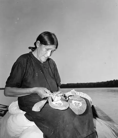 Aboriginal Moccasin Maker on the shores of Hudson Bay
