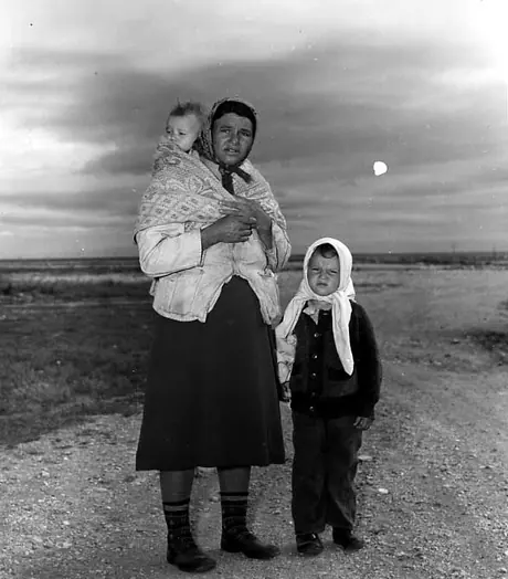 Hudson Bay Railway excursion - Cree woman with baby in her shawl, and young girl
