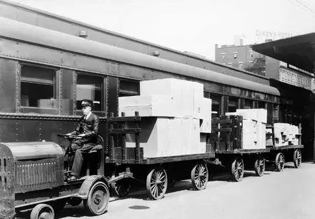 Shipment ready to be loaded from tractor to passenger train