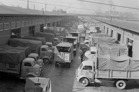 Cartage service trucks lined up at Bonaventure Station freight sheds