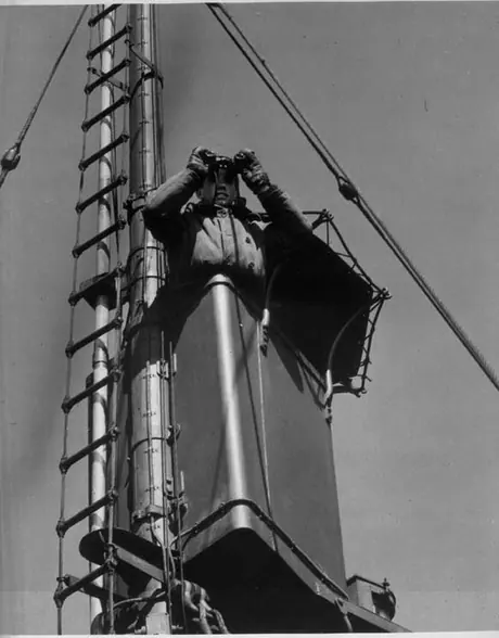 High above the ship, Keeping a careful watch for U-boats