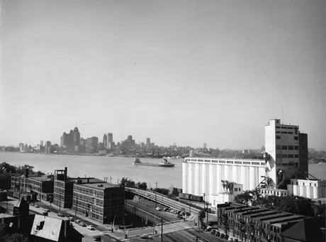 A view of the Hiram Walker Distillerywith the Detroit skyline in the background