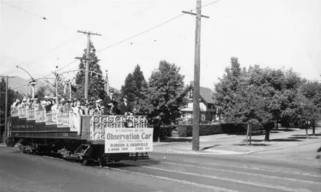 Tourists on an observational streetcar