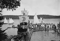 Waterfront activities, including a pirate ship, at Camp Ahmek, on Canoe Lake