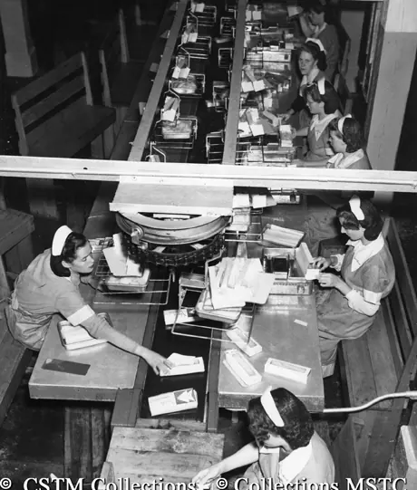 Assembly line weighing and packaging fish filets, Job Brothers and Co. Ltd. Fish Plant