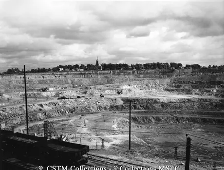View across open pit toward the town of Asbestos