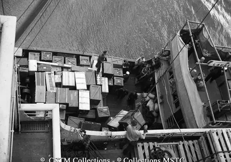 Unloading supplies onboard the Lady Rodney