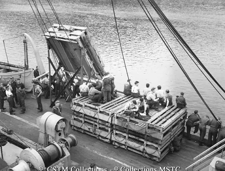 Life rafts being deployed from the Lady Rodney