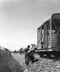 Power ballaster operating on track repair
