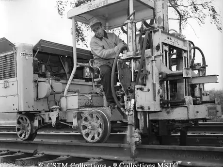 Spike driving machine at work on the Brighton line