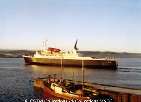 MV Leif Eiriksson entering Port aux Basques, Newfoundland with fishing boats in foreground
