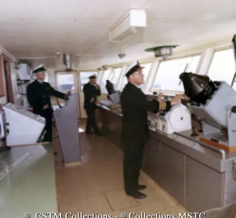 Captain Kean in the wheelhouse of MV Lucy Maud Montgomery