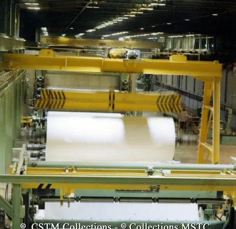 Sheets of paper being rolled at the Gaspesia Paper Mill