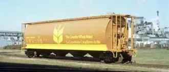 100 tonne steel cylindrical hopper car for grain built for the Canadian Wheat Board by National Steel Car Company in hamilton, Ontario in 1979