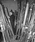 Quebec skiers - baggage man checks skis, Montreal