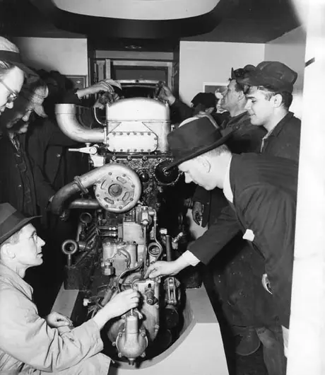 Museum train employees working on the diesel engine