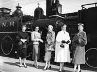 Museum train employees dressed in their own clothes rather than in costume