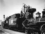 Watering locomotive 674 during its stop at Coteau, Quebec