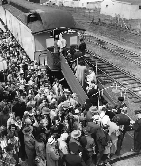 Crowds of people at Aurora Station lining up to take a tour through the coaches of the
Museum Train