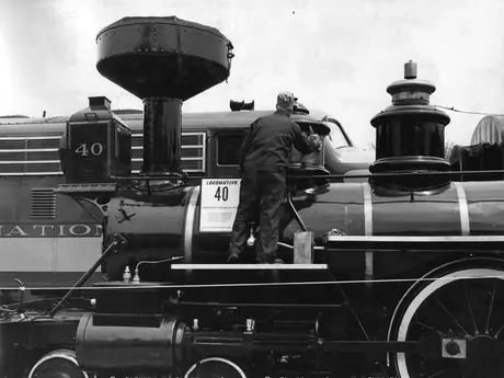Polishing locomotive 40 during its stop at Aurora Station